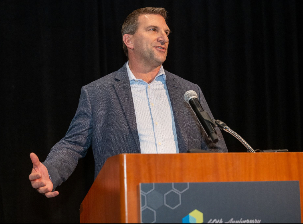 Ken speaking at a conference