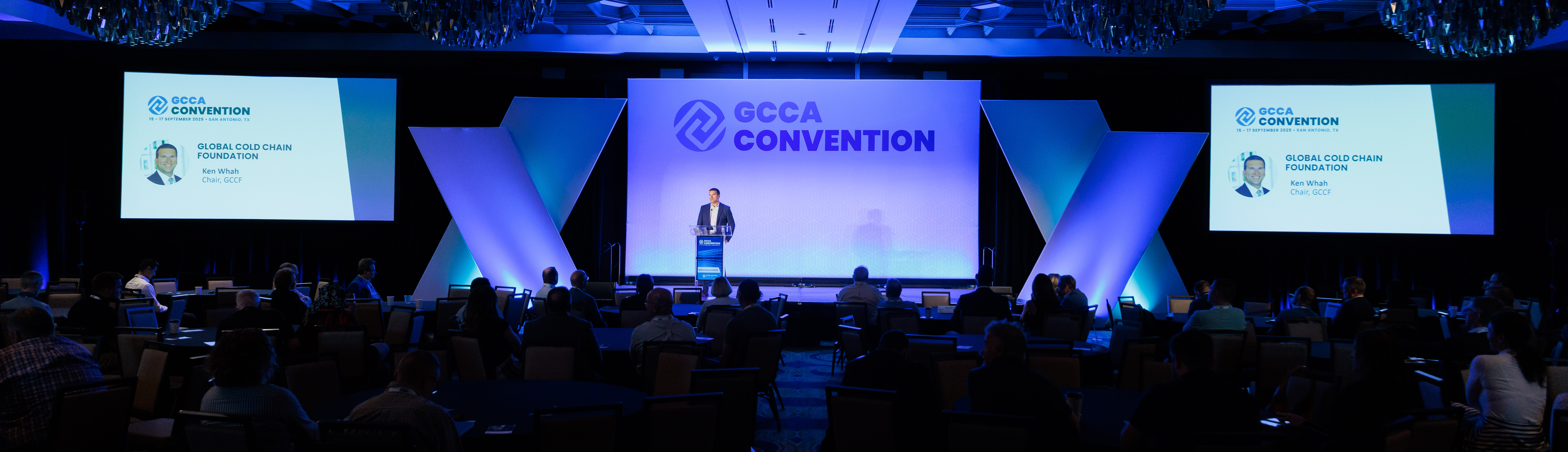 Ken Whah speaking on stage at the GCCA Convention